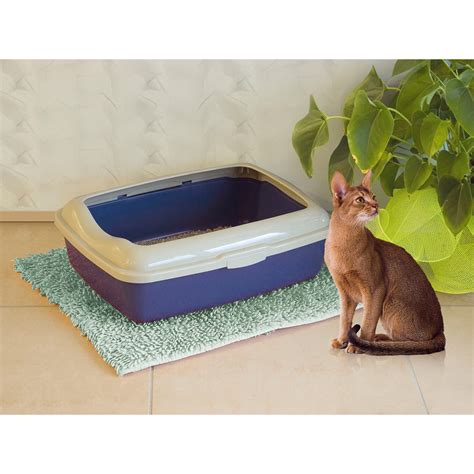 This large covered cat litter box by IRIS USA, Inc. provides privacy for your cat and helps protect floors from scattered litter. This pet litter box has a hinged access door to help contain odors. Jumbo hooded cat litter box includes a doorstep grate to help remove excess litter from paws, plus a matching cat litter scoop. 